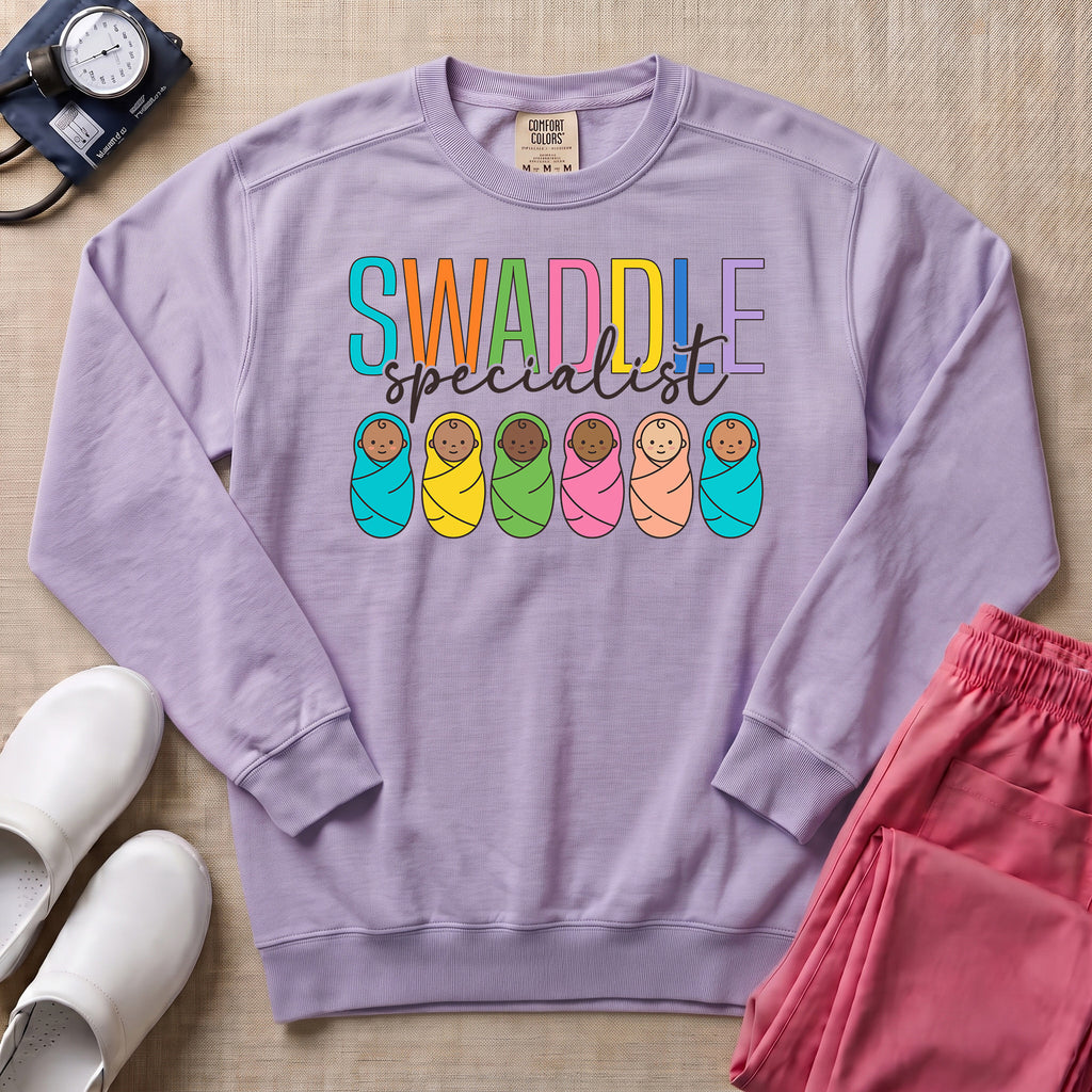 NICU Postpartum Nurse Swaddle Specialist Sweatshirt - Orchid Comfort Colors Sweatshirt | HugTee