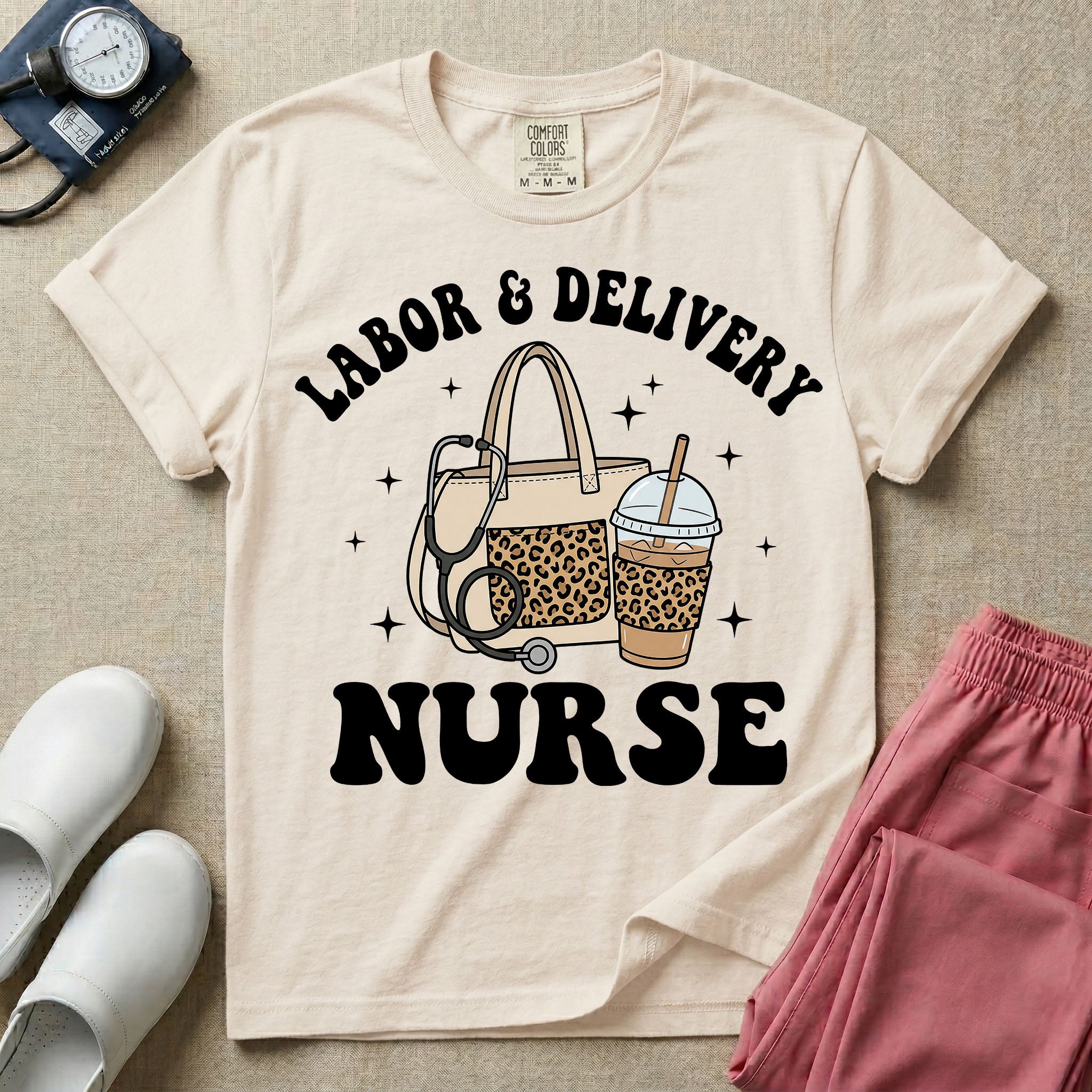 A Labor and Delivery nurse graphic featuring a large beige tote bag with a leopard print pocket, a stethoscope draped over it, and a large iced coffee cup with a matching leopard print sleeve, all surrounded by white text that reads LABOR & DELIVERY curved above and NURSE below.
