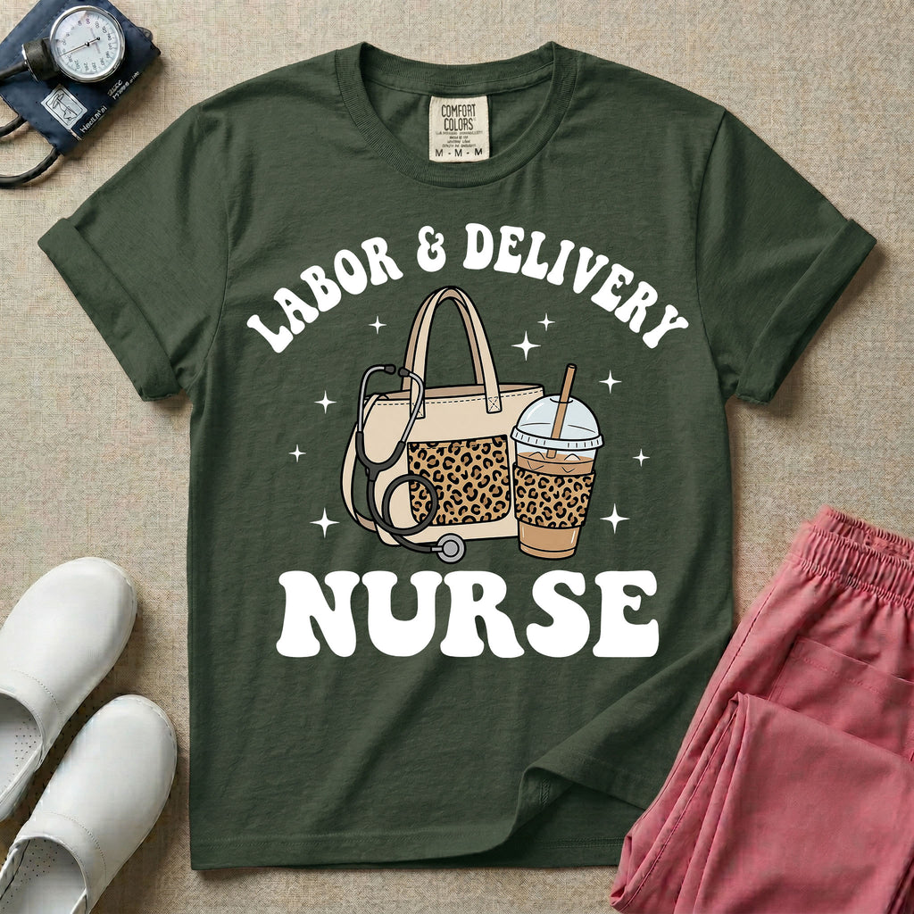 A Labor and Delivery nurse graphic featuring a large beige tote bag with a leopard print pocket, a stethoscope draped over it, and a large iced coffee cup with a matching leopard print sleeve, all surrounded by white text that reads LABOR & DELIVERY curved above and NURSE below.