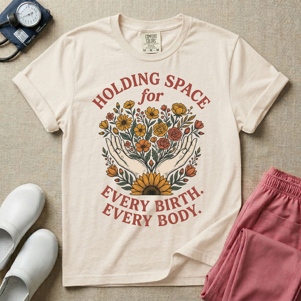 A Labor and Delivery and Doula graphic featuring an illustration of two open hands gently holding a bouquet of wildflowers with a large sunflower at the base, surrounded by white text that reads HOLDING SPACE for above and EVERY BIRTH. EVERY BODY. below.