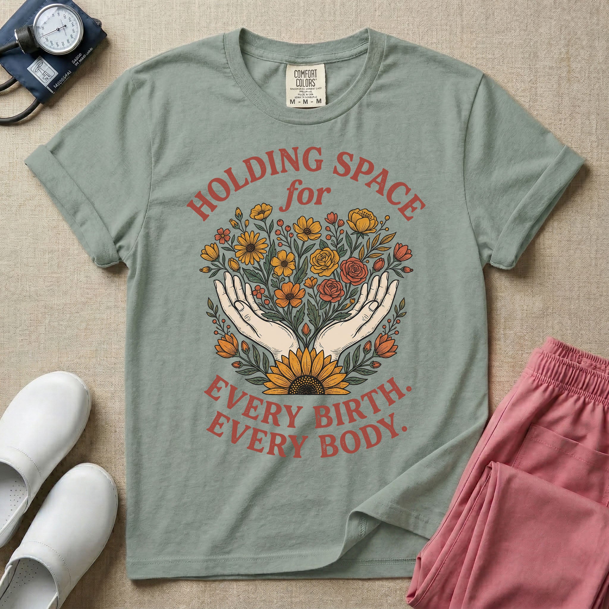A Labor and Delivery and Doula graphic featuring an illustration of two open hands gently holding a bouquet of wildflowers with a large sunflower at the base, surrounded by white text that reads HOLDING SPACE for above and EVERY BIRTH. EVERY BODY. below.