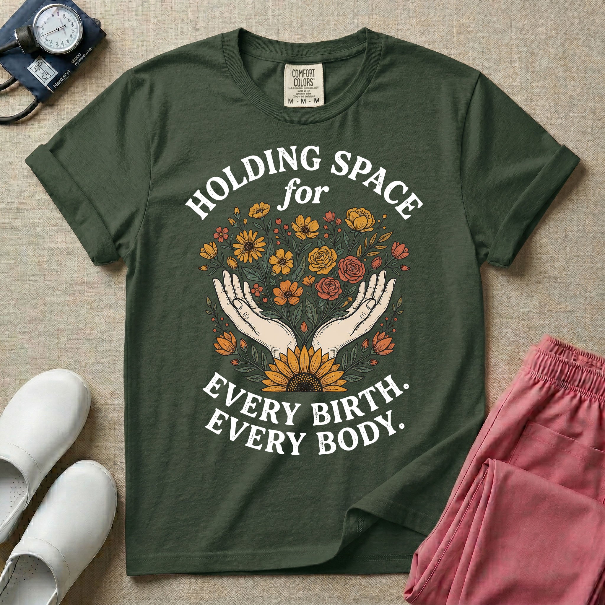 A Labor and Delivery and Doula graphic featuring an illustration of two open hands gently holding a bouquet of wildflowers with a large sunflower at the base, surrounded by white text that reads HOLDING SPACE for above and EVERY BIRTH. EVERY BODY. below.