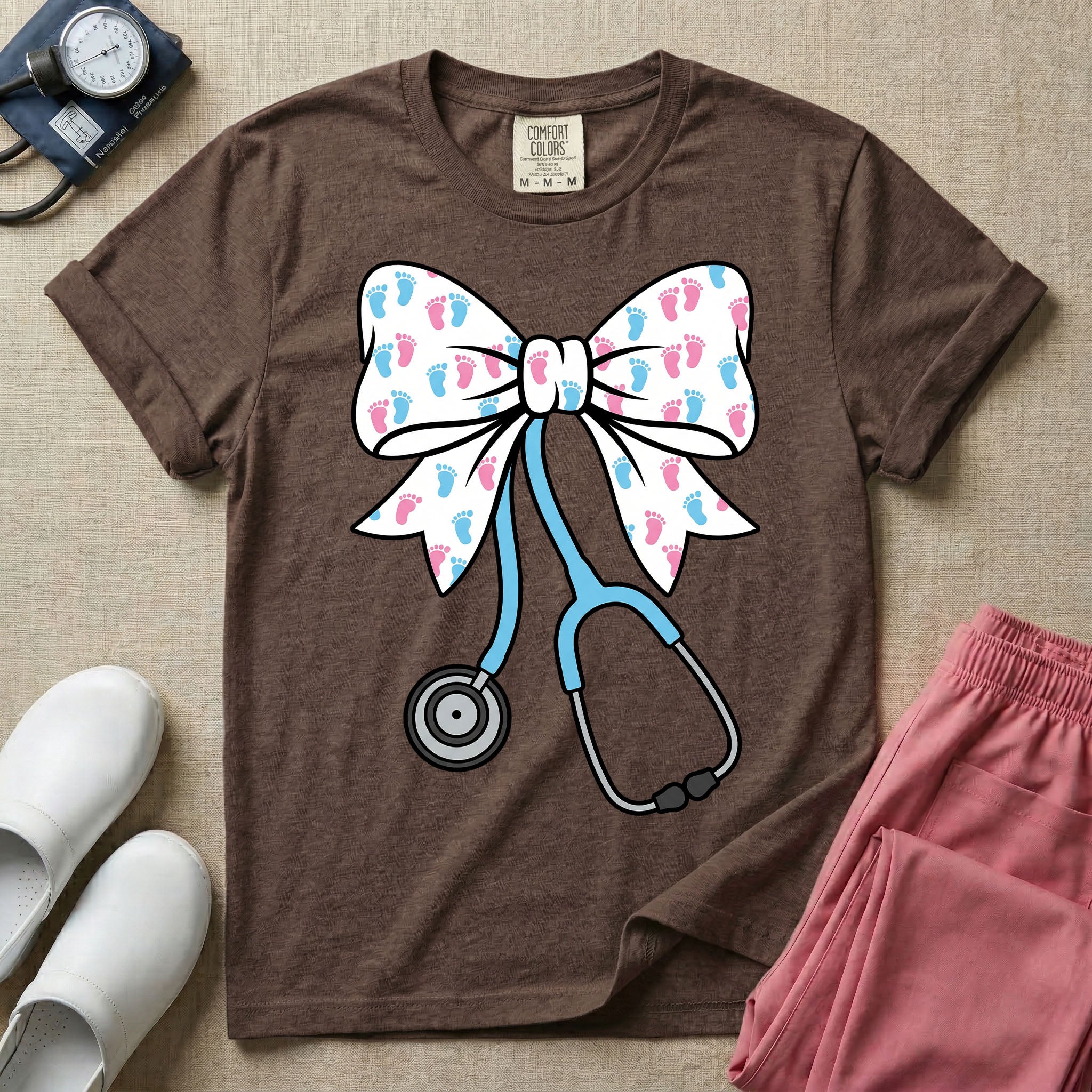 Labor and Delivery & NICU nurse graphic featuring a large white coquette bow patterned with pink and blue baby footprints and an attached blue stethoscope.