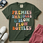 NICU nurse graphic featuring the phrase PREMIES SWADDLES & SLOW FLOW BOTTLES written in colorful retro wavy bubble letters.