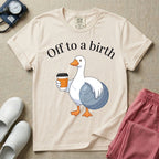 A humorous Labor and Delivery, Midwife, or Doula design featuring a cute cartoon white duck holding a steaming coffee cup and a birthing ball beneath the text "Off to a birth".