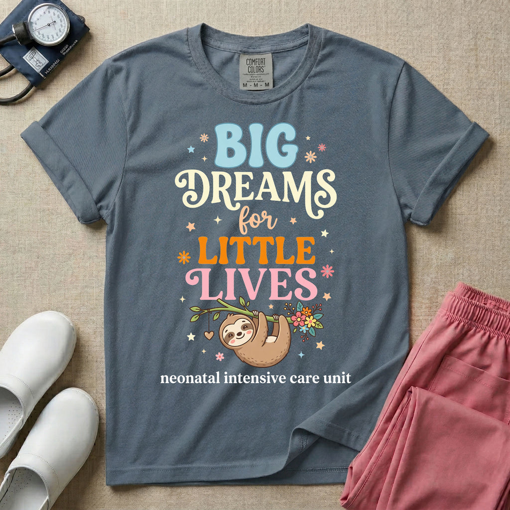 A cute Neonatal Intensive Care Unit nurse design featuring a smiling sloth hanging from a leafy branch decorated with colorful flowers and a dangling heart, surrounded by small stars, beneath the text "BIG Dreams for LITTLE LIVES neonatal intensive care unit" in varied, colorful typography.