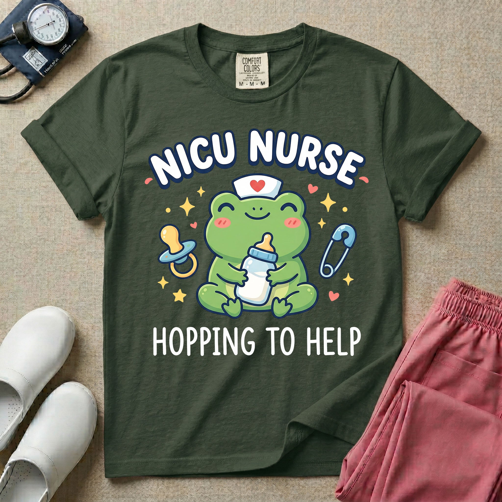 A cute Neonatal Intensive Care Unit nurse design featuring a smiling green frog wearing a nurse hat with a red heart, holding a baby bottle, accompanied by a floating pacifier, safety pin, stars, and hearts, surrounded by the text "NICU NURSE HOPPING TO HELP".
