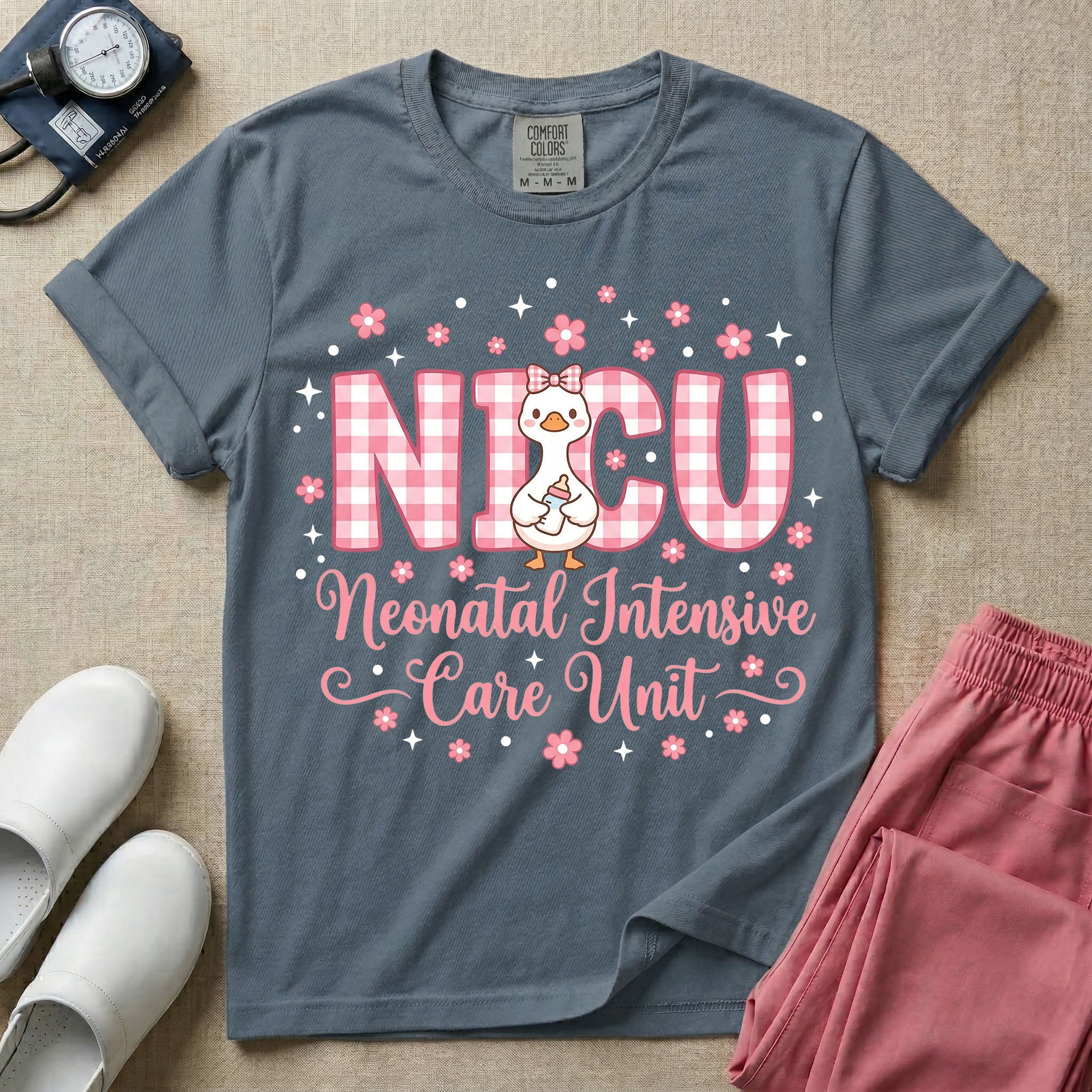 A cute Neonatal Intensive Care Unit nurse design featuring large pink and white gingham letters spelling NICU, with a sweet white duck wearing a pink hair bow and holding a baby bottle, surrounded by pink flowers, white stars, and the text "Neonatal Intensive Care Unit" in a pink cursive font.