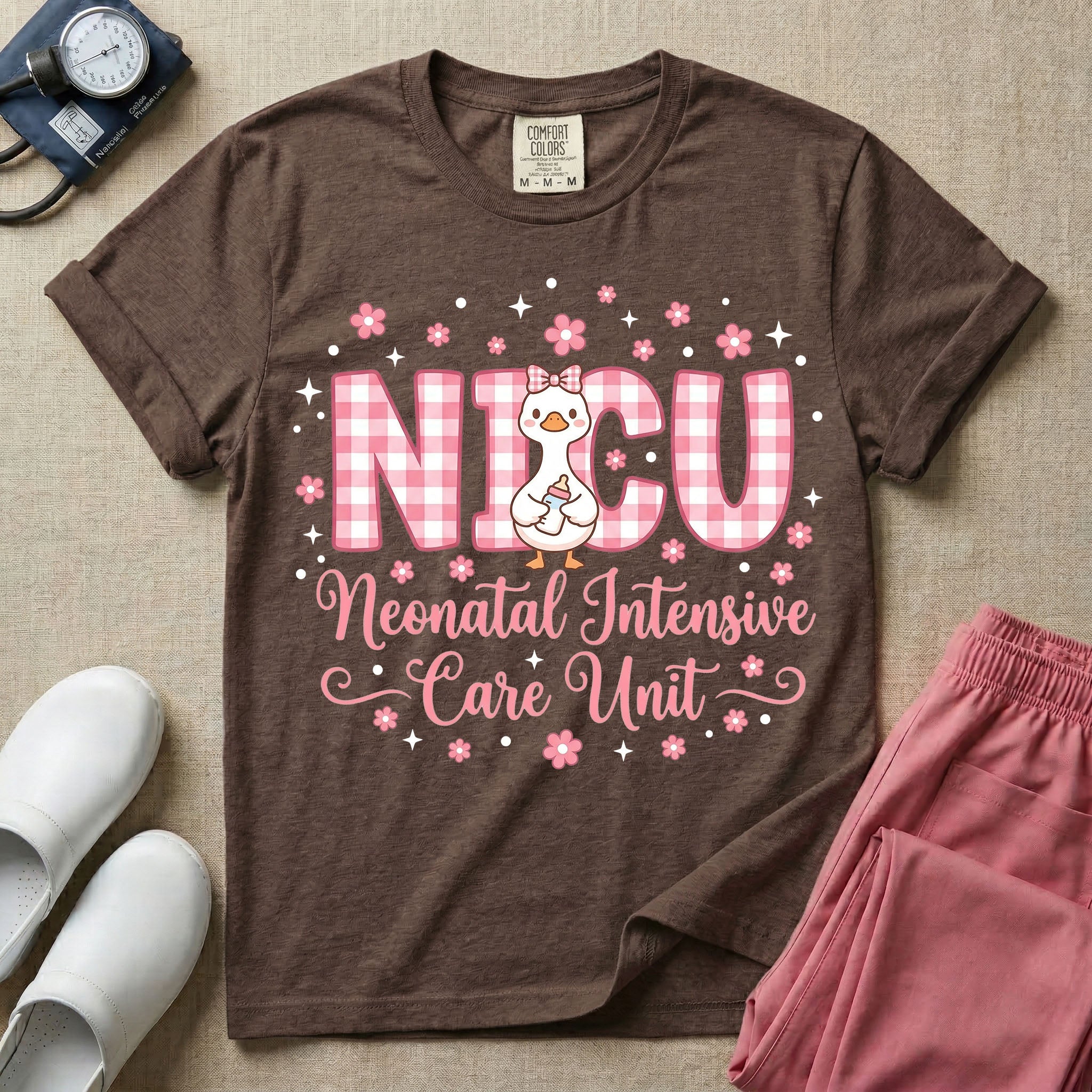 A cute Neonatal Intensive Care Unit nurse design featuring large pink and white gingham letters spelling NICU, with a sweet white duck wearing a pink hair bow and holding a baby bottle, surrounded by pink flowers, white stars, and the text "Neonatal Intensive Care Unit" in a pink cursive font.