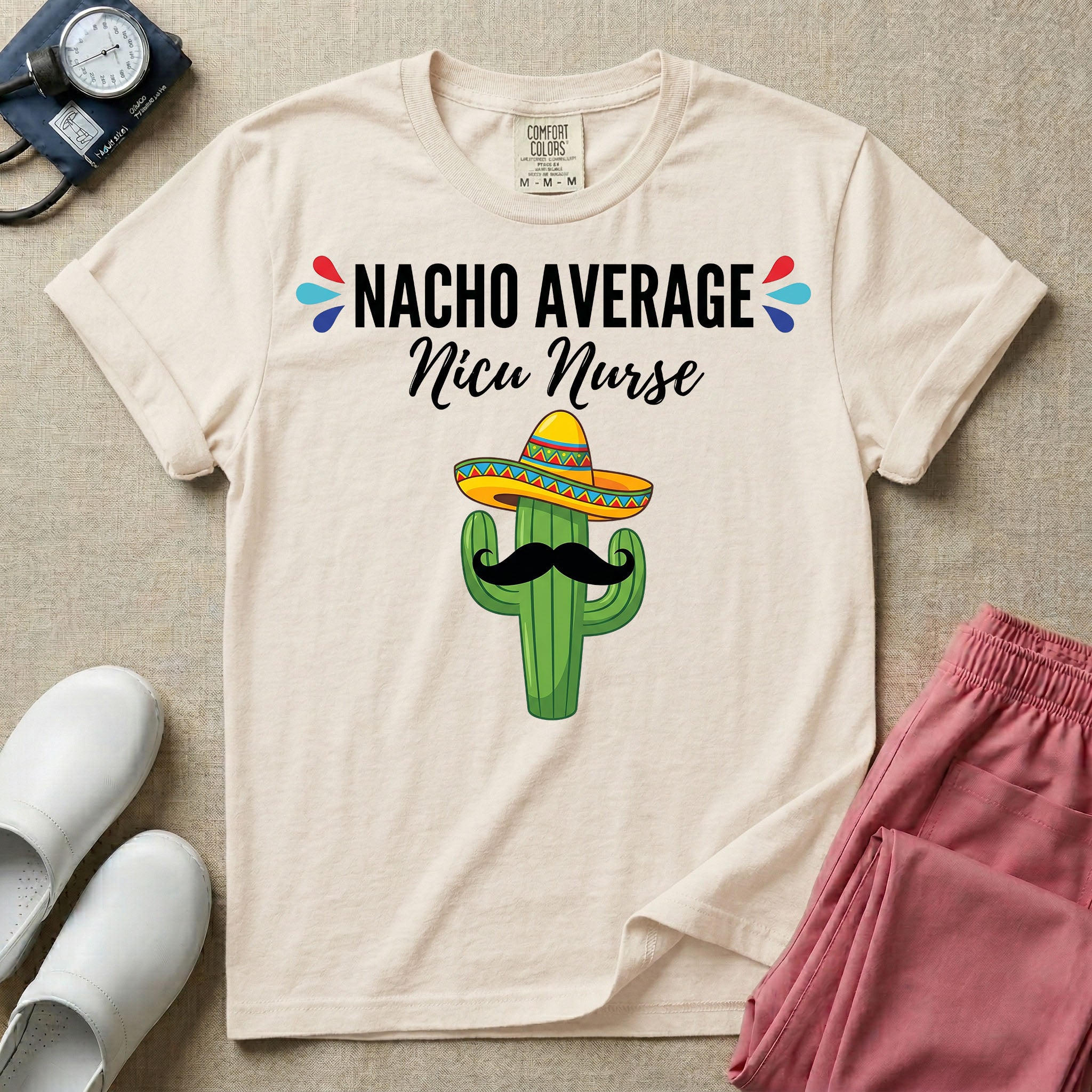 A humorous Neonatal Intensive Care Unit nurse design featuring a green cactus wearing a colorful striped sombrero and a black mustache, positioned below the text "NACHO AVERAGE Nicu Nurse" with red and blue decorative teardrop accents.