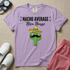 A humorous Neonatal Intensive Care Unit nurse design featuring a green cactus wearing a colorful striped sombrero and a black mustache, positioned below the text "NACHO AVERAGE Nicu Nurse" with red and blue decorative teardrop accents.
