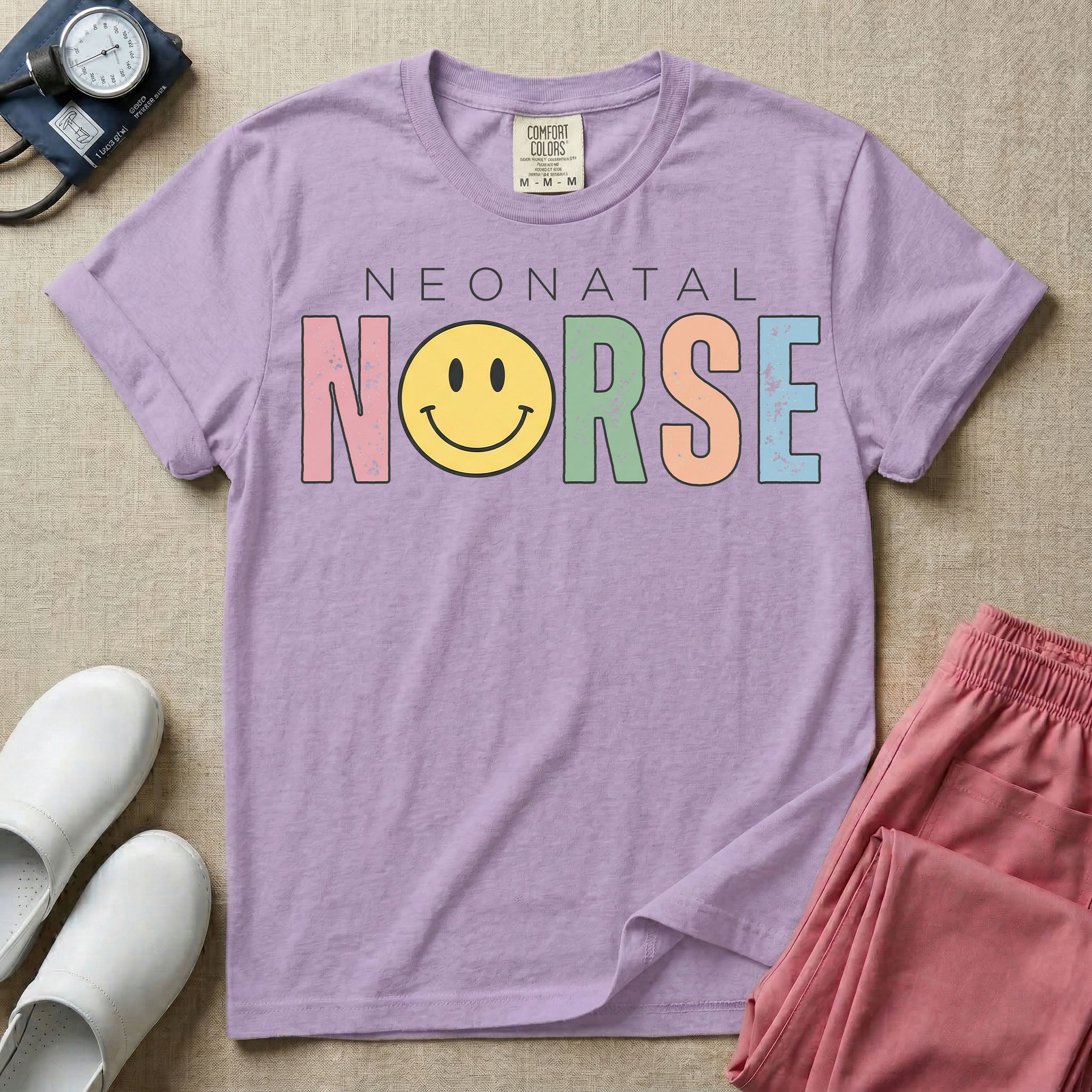 A retro Neonatal Intensive Care Unit nurse design featuring the word "NEONATAL" in simple white lettering above the word "NURSE" spelled out in large, distressed, pastel-colored letters, with a classic yellow smiley face replacing the letter U.