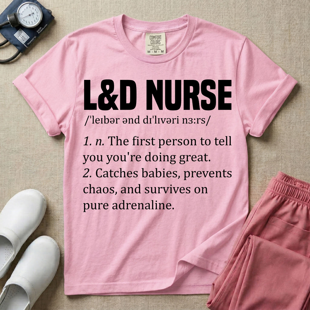 A graphic featuring a dictionary definition style layout with the bold heading L&D NURSE, followed by the phonetic pronunciation and two humorous definitions reading "1. n. The first person to tell you you're doing great." and "2. Catches babies, prevents chaos, and survives on pure adrenaline." in white text, designed for labor and delivery nurses.