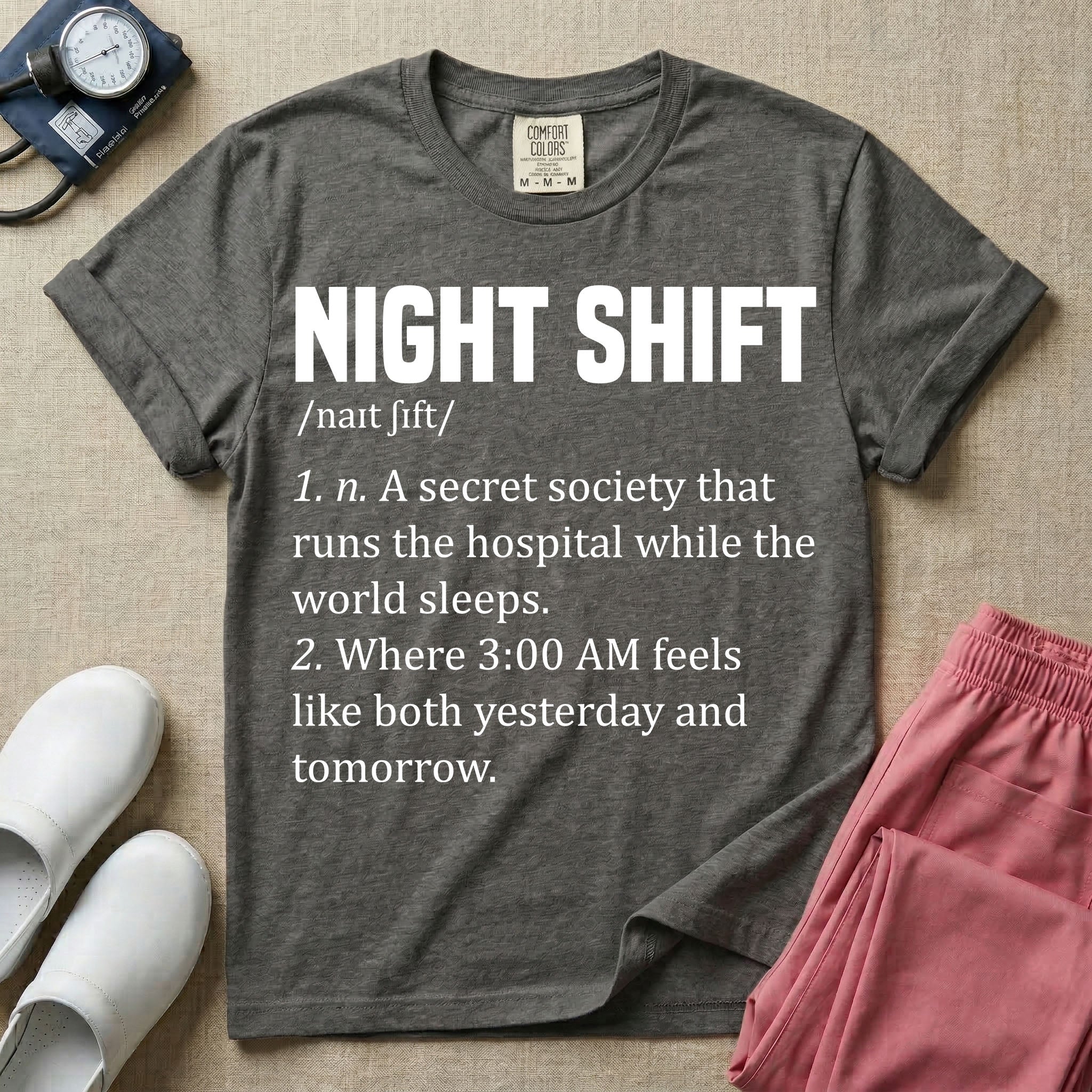 A graphic featuring a dictionary definition style layout with the bold heading NIGHT SHIFT, followed by the phonetic pronunciation and two humorous definitions reading "1. n. A secret society that runs the hospital while the world sleeps." and "2. Where 3:00 AM feels like both yesterday and tomorrow." in white text, designed for night shift nurses.