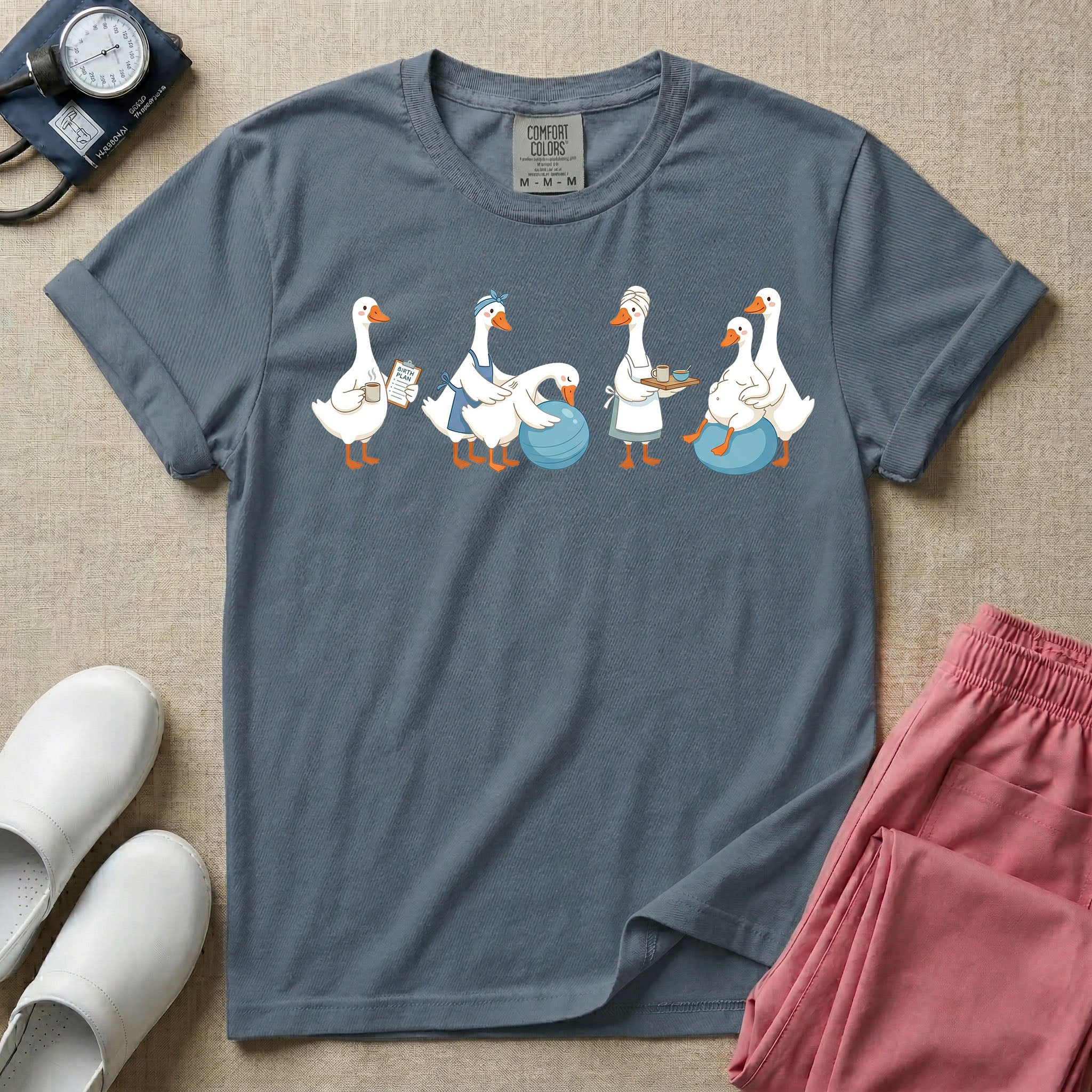 A graphic featuring a row of ducks playfully acting out a labor and delivery scene, including a duck checking a birth plan clipboard, ducks assisting a pregnant duck on a birthing ball, and a duck carrying a recovery tray, designed for labor and delivery nurses, midwives, and doulas.