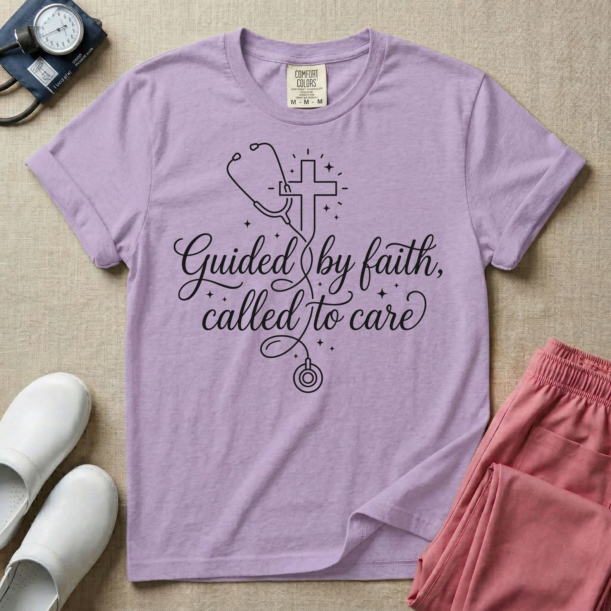 A graphic featuring a minimalist white line art stethoscope that loops into the shape of a cross, accompanied by the phrase "Guided by faith, called to care" in an elegant cursive script surrounded by small stars, designed for nurses.