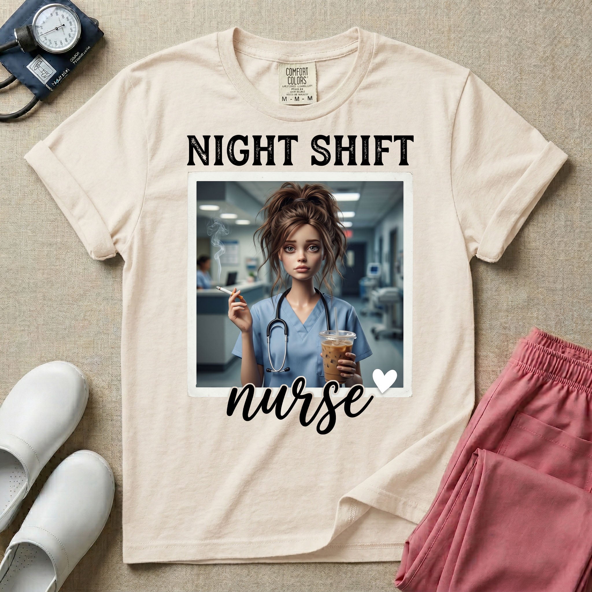 A graphic featuring the words "NIGHT SHIFT" above a framed image of an exhausted nurse in scrubs holding a lit cigarette and a large iced coffee, with the word "nurse" in cursive and a small heart below, designed for general nursing.