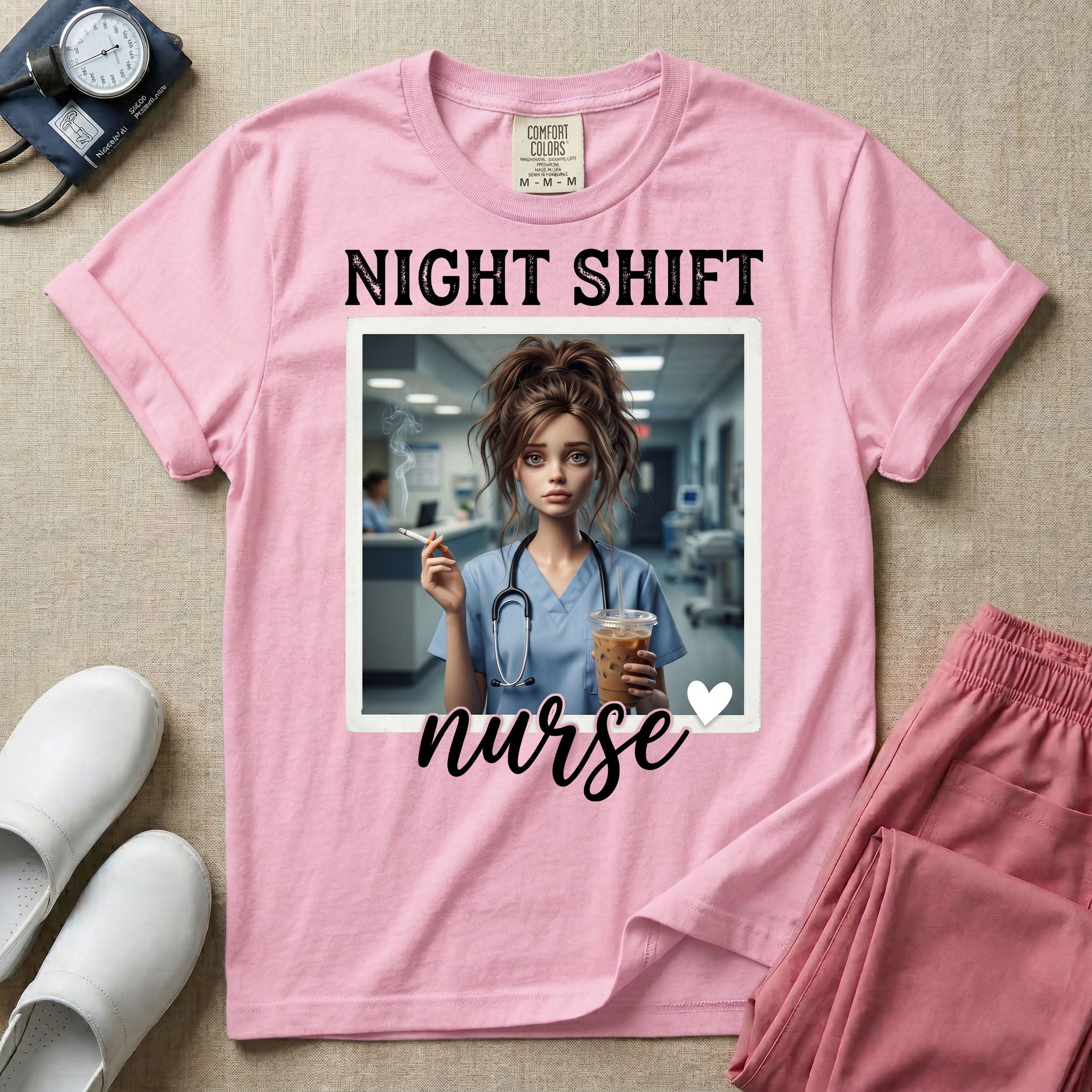 A graphic featuring the words "NIGHT SHIFT" above a framed image of an exhausted nurse in scrubs holding a lit cigarette and a large iced coffee, with the word "nurse" in cursive and a small heart below, designed for general nursing.