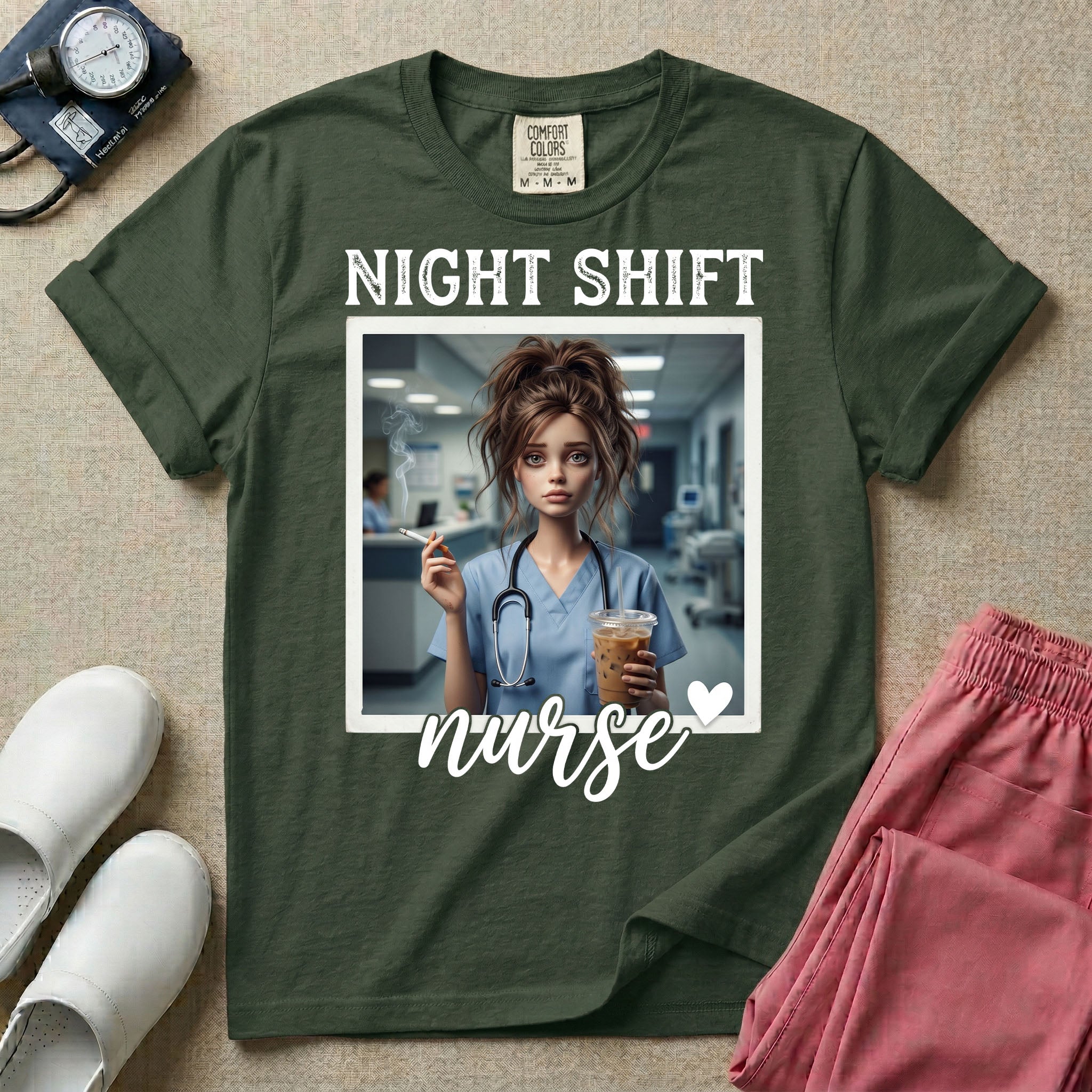 A graphic featuring the words "NIGHT SHIFT" above a framed image of an exhausted nurse in scrubs holding a lit cigarette and a large iced coffee, with the word "nurse" in cursive and a small heart below, designed for general nursing.