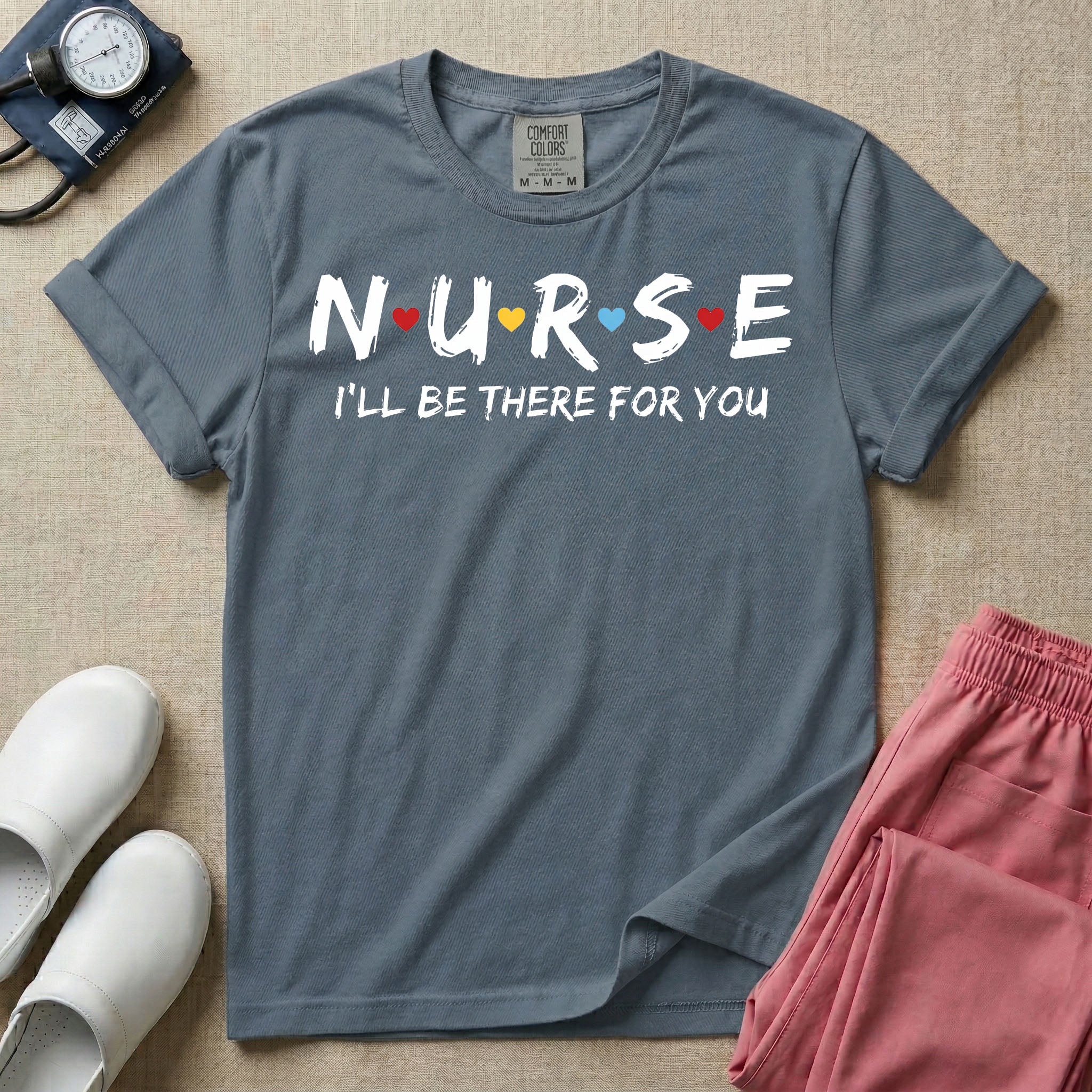 A graphic featuring the word NURSE in a stylized white font with small red, yellow, and blue hearts separating the letters, positioned above the phrase I'LL BE THERE FOR YOU in matching white text, designed for general nursing.