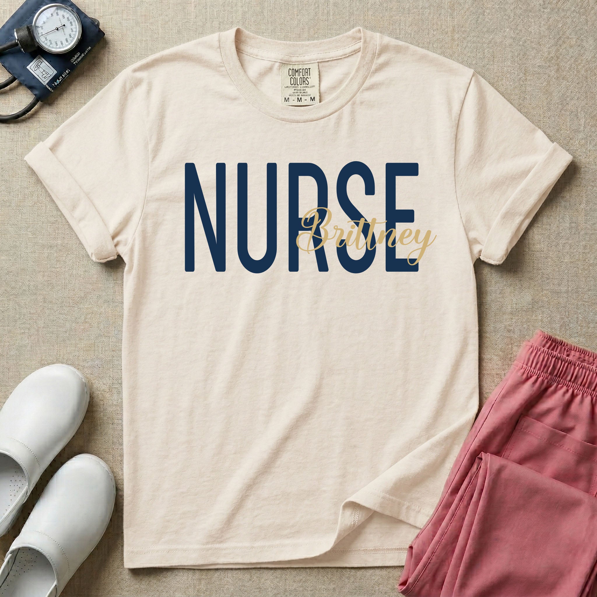A minimalist graphic featuring the word NURSE in a large, bold font with the custom name Brittney overlapping it in an elegant cursive script, designed for general nursing.