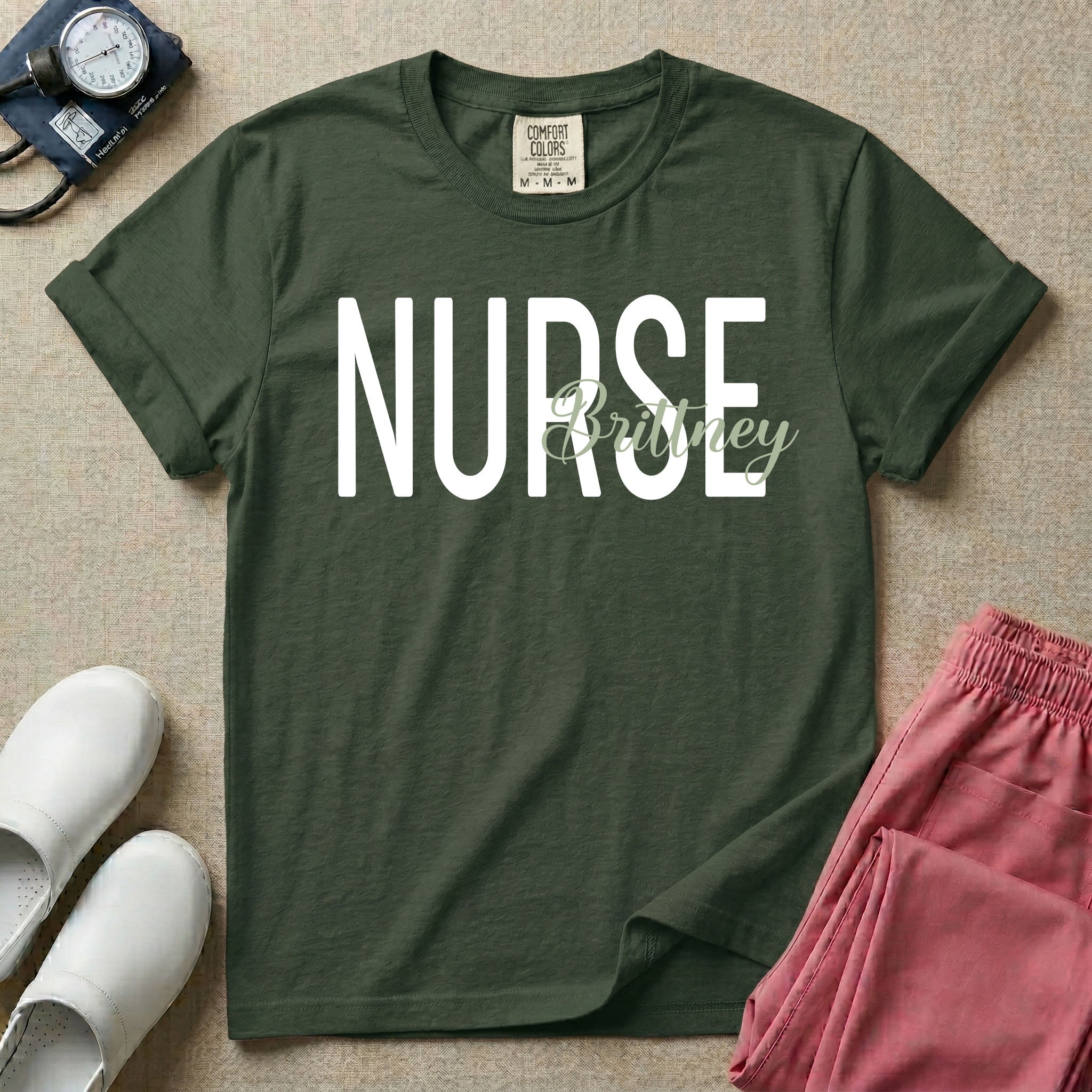 A minimalist graphic featuring the word NURSE in a large, bold font with the custom name Brittney overlapping it in an elegant cursive script, designed for general nursing.
