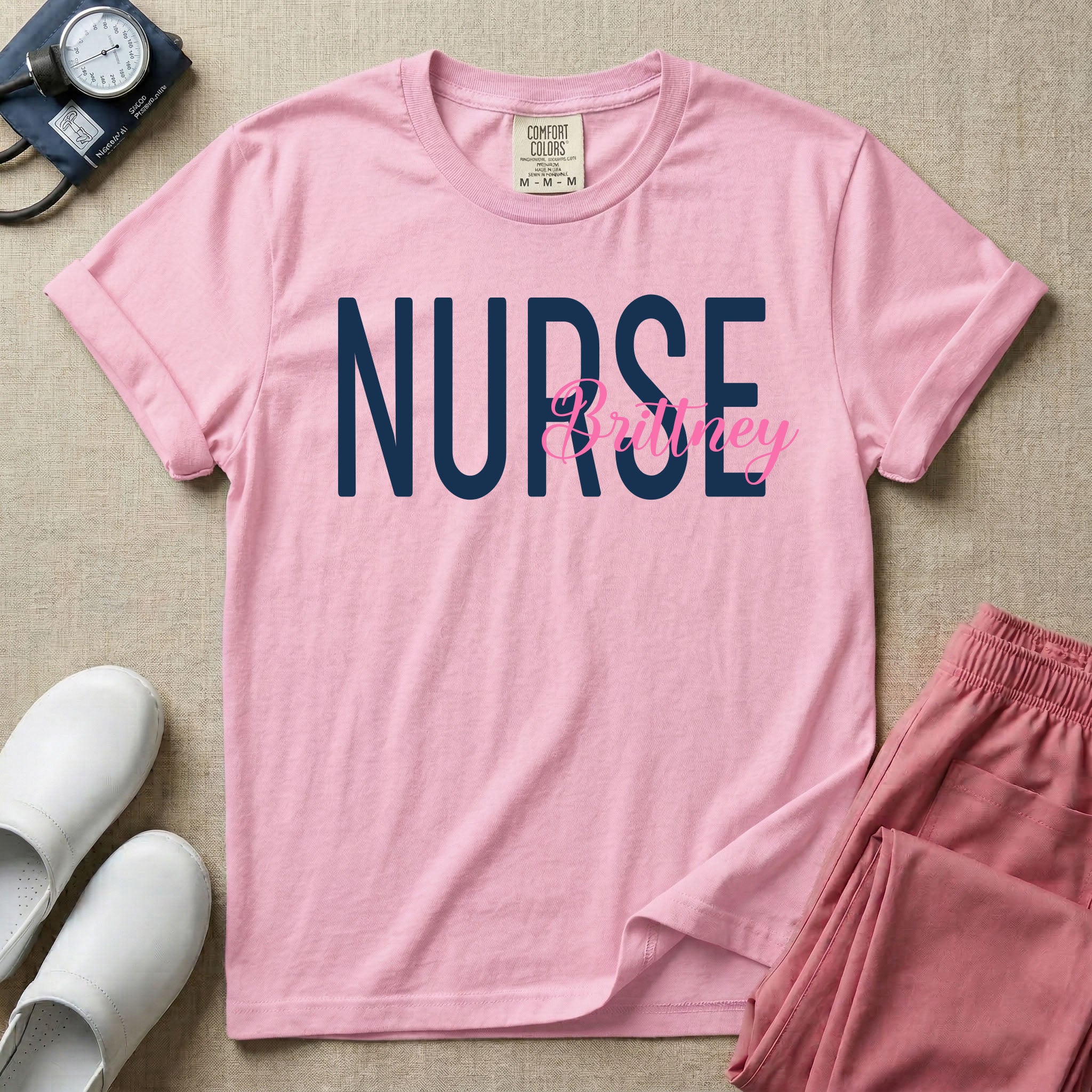 A minimalist graphic featuring the word NURSE in a large, bold font with the custom name Brittney overlapping it in an elegant cursive script, designed for general nursing.