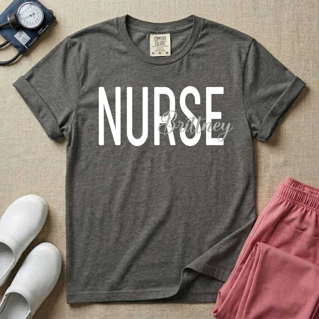 A minimalist graphic featuring the word NURSE in a large, bold font with the custom name Brittney overlapping it in an elegant cursive script, designed for general nursing.
