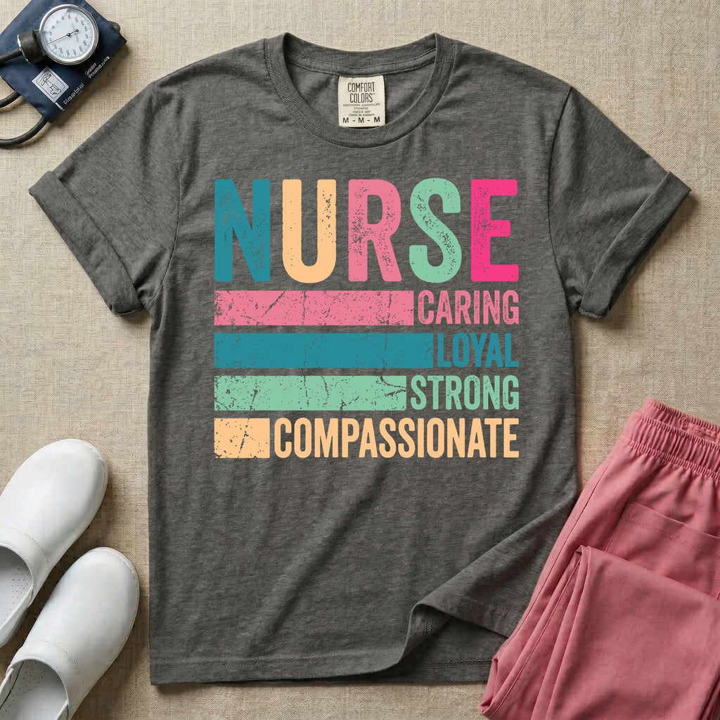 A retro graphic design for general nursing featuring the word NURSE in large, colorful distressed block letters above horizontal stripes reading CARING, LOYAL, STRONG, and COMPASSIONATE.