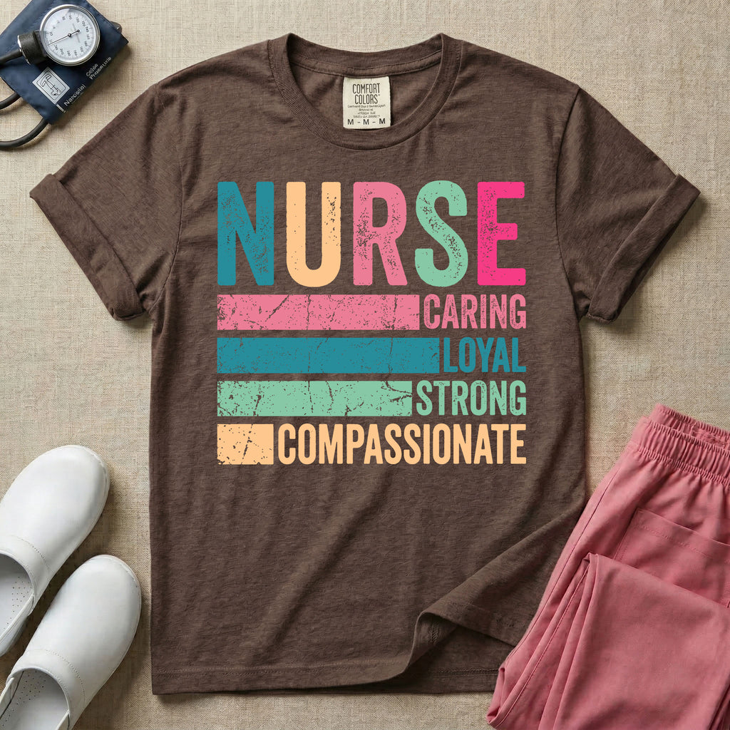 A retro graphic design for general nursing featuring the word NURSE in large, colorful distressed block letters above horizontal stripes reading CARING, LOYAL, STRONG, and COMPASSIONATE.