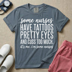A funny graphic design for general nursing featuring white typography that reads some nurses HAVE TATTOOS PRETTY EYES AND CUSS TOO MUCH. it's me. i'm some nurses.