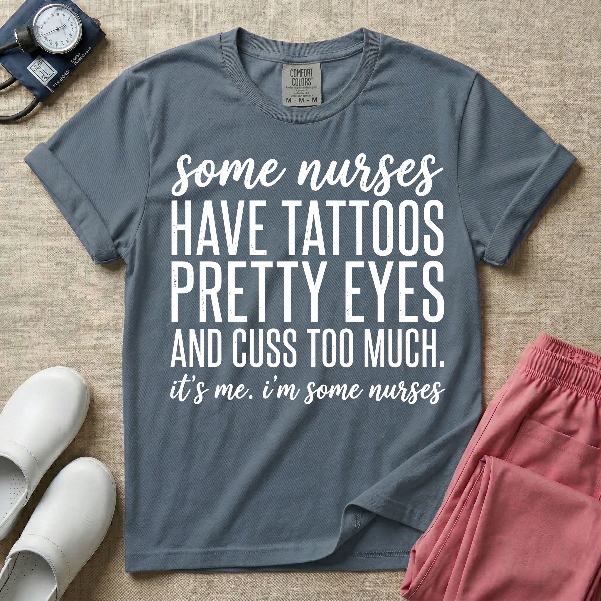 A funny graphic design for general nursing featuring white typography that reads some nurses HAVE TATTOOS PRETTY EYES AND CUSS TOO MUCH. it's me. i'm some nurses.