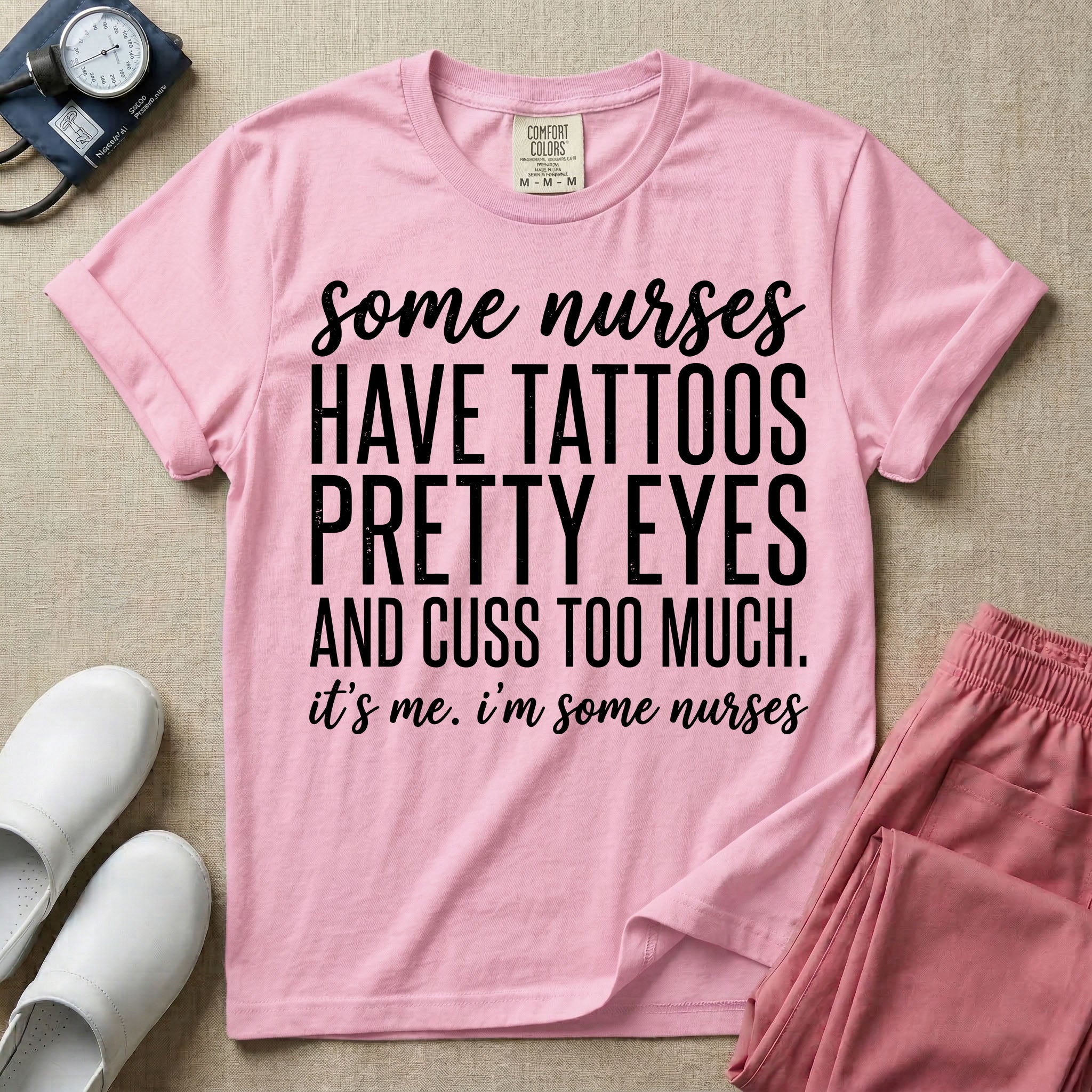 A funny graphic design for general nursing featuring white typography that reads some nurses HAVE TATTOOS PRETTY EYES AND CUSS TOO MUCH. it's me. i'm some nurses.
