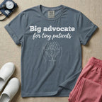 A minimalist graphic design for NICU nursing featuring the text Big advocate for tiny patients in white lettering above a continuous line art illustration of two hands gently holding a small baby footprint.