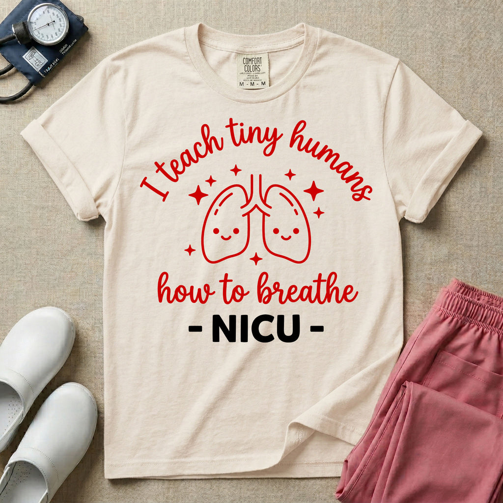 A cute graphic design for NICU nursing featuring pink illustrations of smiling lungs surrounded by little sparkles, with the text I teach tiny humans how to breathe above and NICU below.