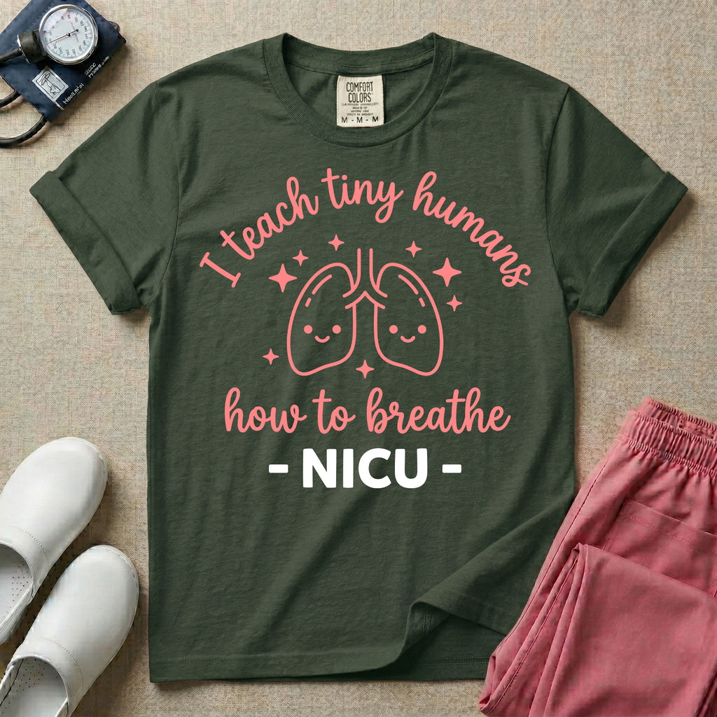 A cute graphic design for NICU nursing featuring pink illustrations of smiling lungs surrounded by little sparkles, with the text I teach tiny humans how to breathe above and NICU below.