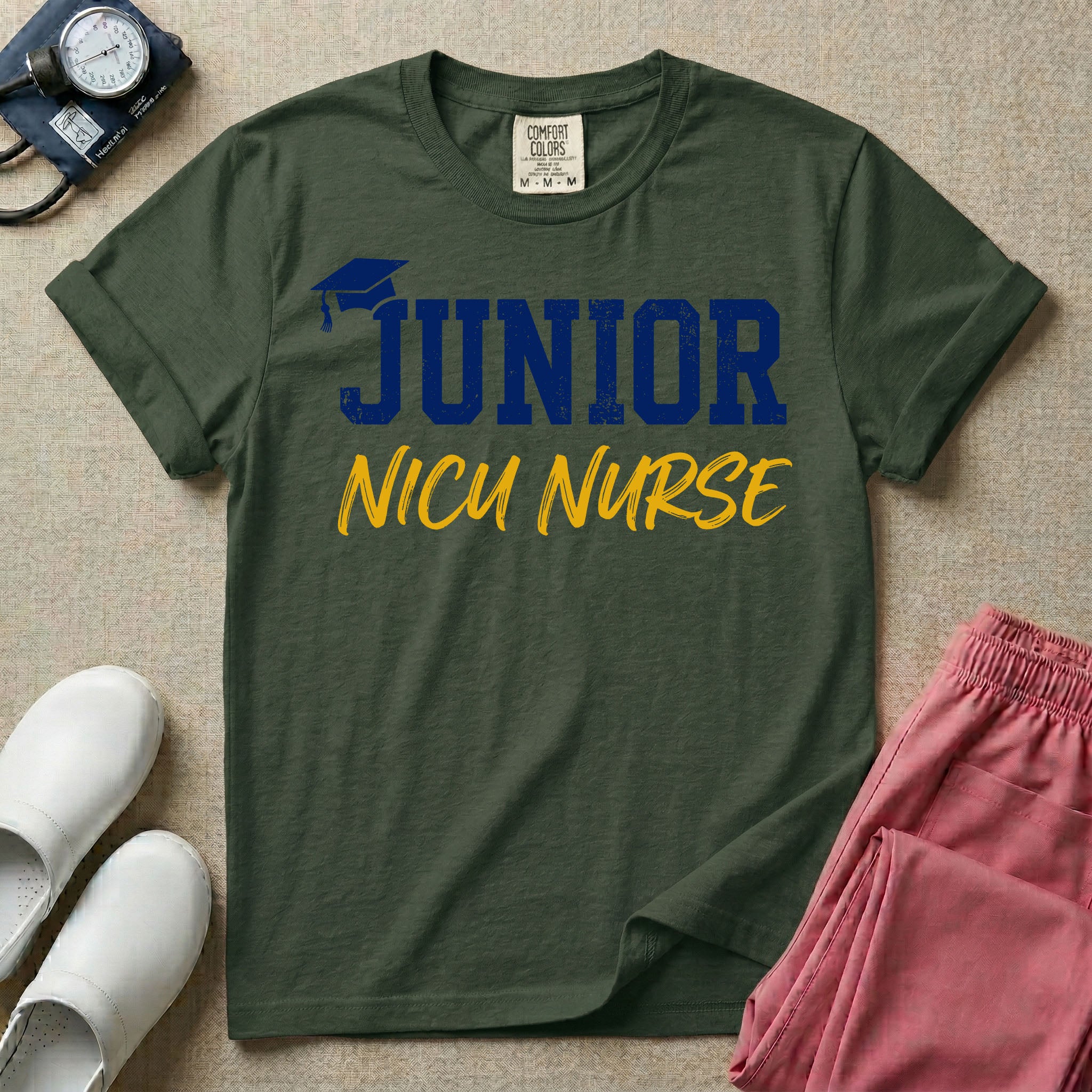 A graphic design for NICU nursing featuring a graduation cap resting on the word JUNIOR in distressed collegiate block letters, with NICU NURSE written below in a casual script.