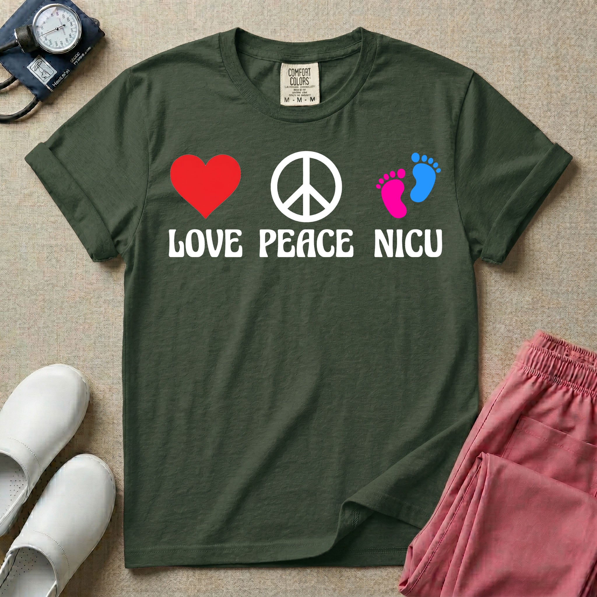 A retro graphic design for NICU nursing featuring a red heart, a white peace sign, and a pair of pink and blue baby footprints, positioned above the words LOVE PEACE NICU in a white groovy font.