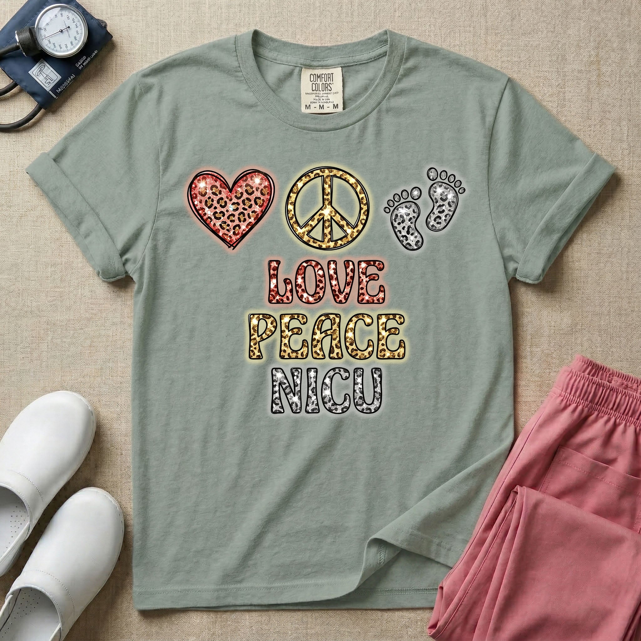 A graphic design for NICU nursing featuring a glittery leopard print heart, peace sign, and baby footprints aligned horizontally above the stacked words LOVE PEACE NICU in matching textured animal print lettering.
