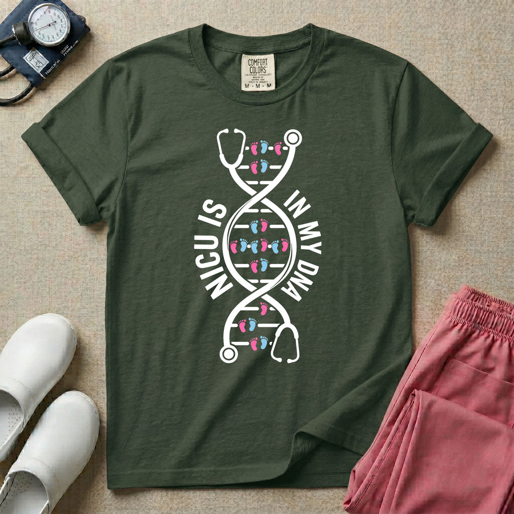 A graphic design for NICU nursing featuring a white DNA double helix structure intertwined with a stethoscope, where the rungs of the DNA strand are made of tiny pink and blue baby footprints, accompanied by the text NICU IS on the left and IN MY DNA on the right.