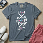 A graphic design for NICU nursing featuring a white DNA double helix structure intertwined with a stethoscope, where the rungs of the DNA strand are made of tiny pink and blue baby footprints, accompanied by the text NICU IS on the left and IN MY DNA on the right.
