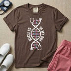 A graphic design for NICU nursing featuring a white DNA double helix structure intertwined with a stethoscope, where the rungs of the DNA strand are made of tiny pink and blue baby footprints, accompanied by the text NICU IS on the left and IN MY DNA on the right.