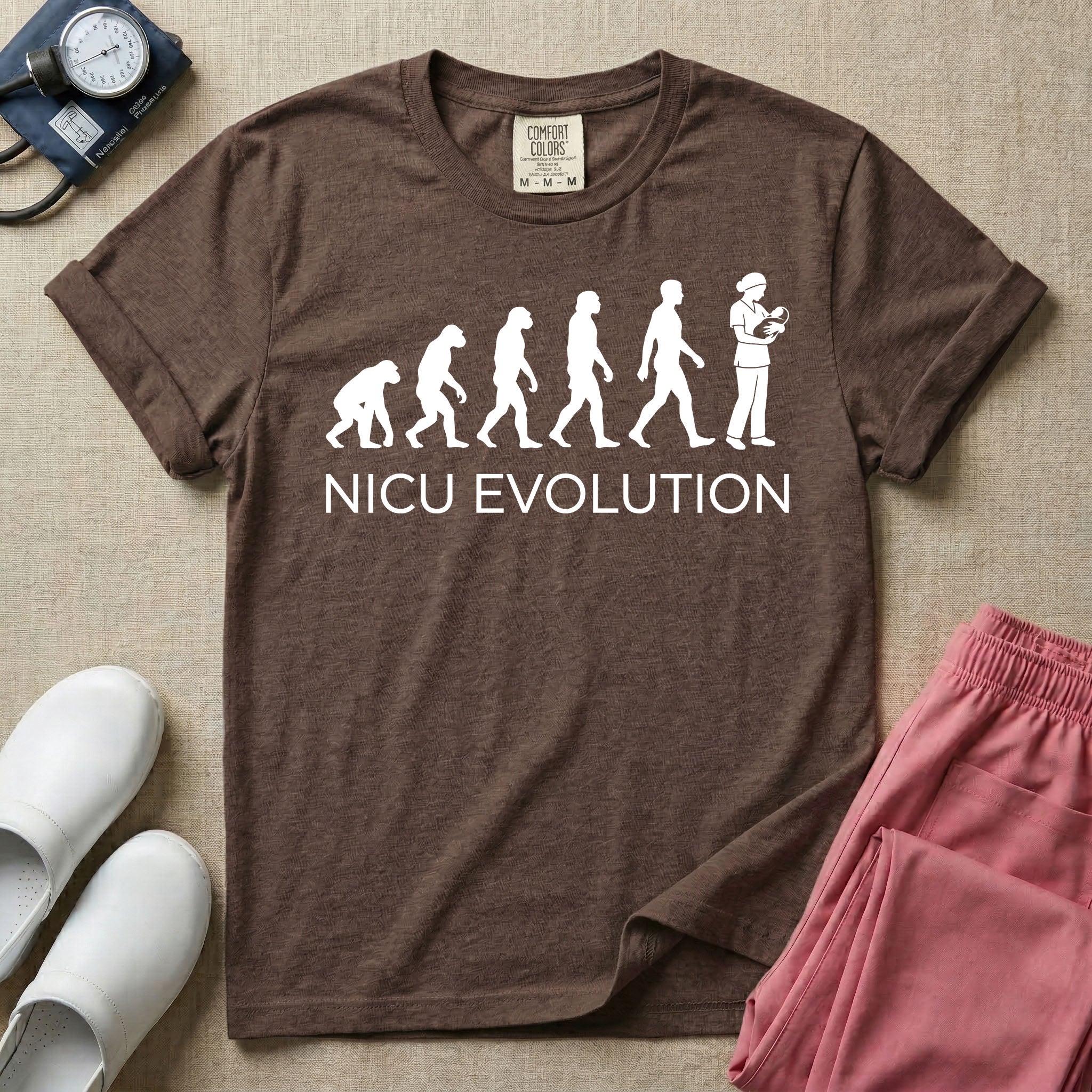 A funny minimalist graphic design for NICU nursing featuring a white silhouette illustration of human evolution progressing from an ape to a modern human, culminating in a nurse wearing scrubs holding a newborn baby, with the text NICU EVOLUTION written directly below.