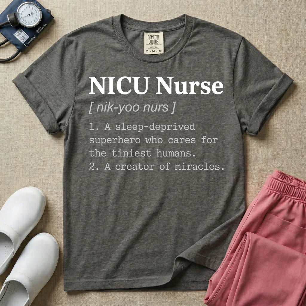 A minimalist neonatal intensive care unit t-shirt featuring a funny dictionary definition graphic that reads "NICU Nurse [ nik-yoo nurs ] 1. A sleep-deprived superhero who cares for the tiniest humans. 2. A creator of miracles."