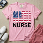 A retro neonatal intensive care unit t-shirt featuring the text "NICU NURSE" with a distressed American flag graphic inside the letters, replacing the traditional stars with tiny white baby footprints.