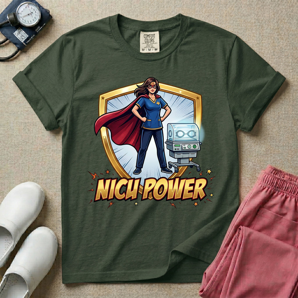 A comic book style neonatal intensive care unit t-shirt featuring an illustration of a confident female nurse wearing a red superhero cape and mask, standing next to an infant incubator inside a golden shield, with the bold text "NICU POWER" below.