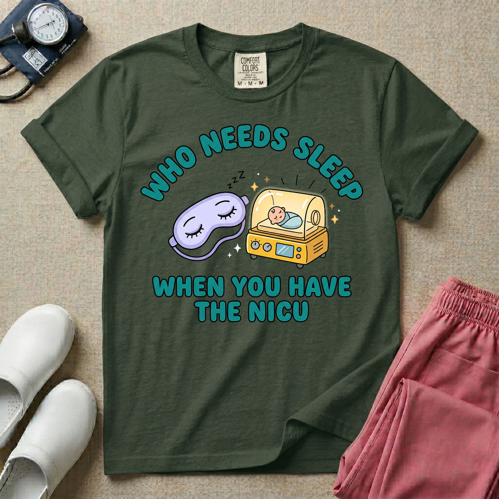 A funny neonatal intensive care unit t-shirt featuring an illustration of a purple sleep mask with Zs next to a yellow infant incubator with a baby inside, surrounded by the text "WHO NEEDS SLEEP WHEN YOU HAVE THE NICU" in a bold teal font.