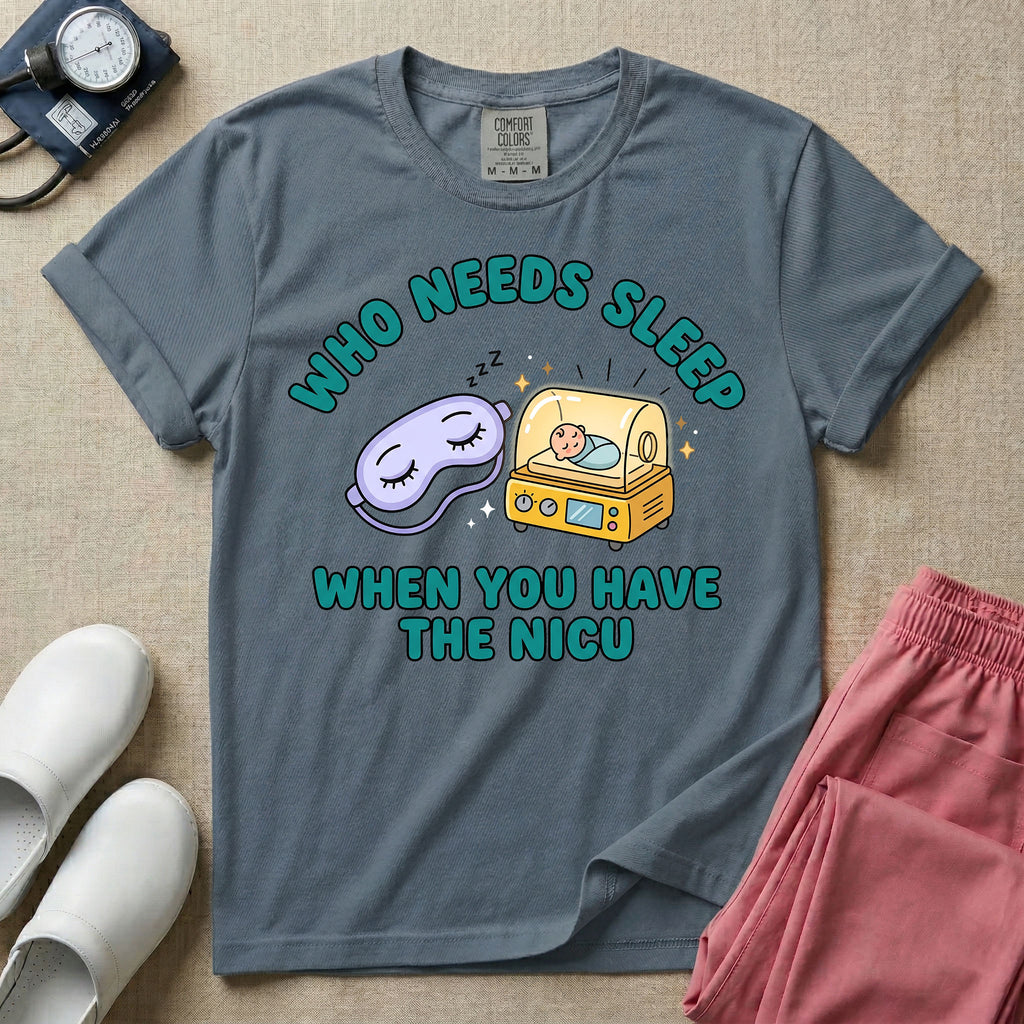 A funny neonatal intensive care unit t-shirt featuring an illustration of a purple sleep mask with Zs next to a yellow infant incubator with a baby inside, surrounded by the text "WHO NEEDS SLEEP WHEN YOU HAVE THE NICU" in a bold teal font.