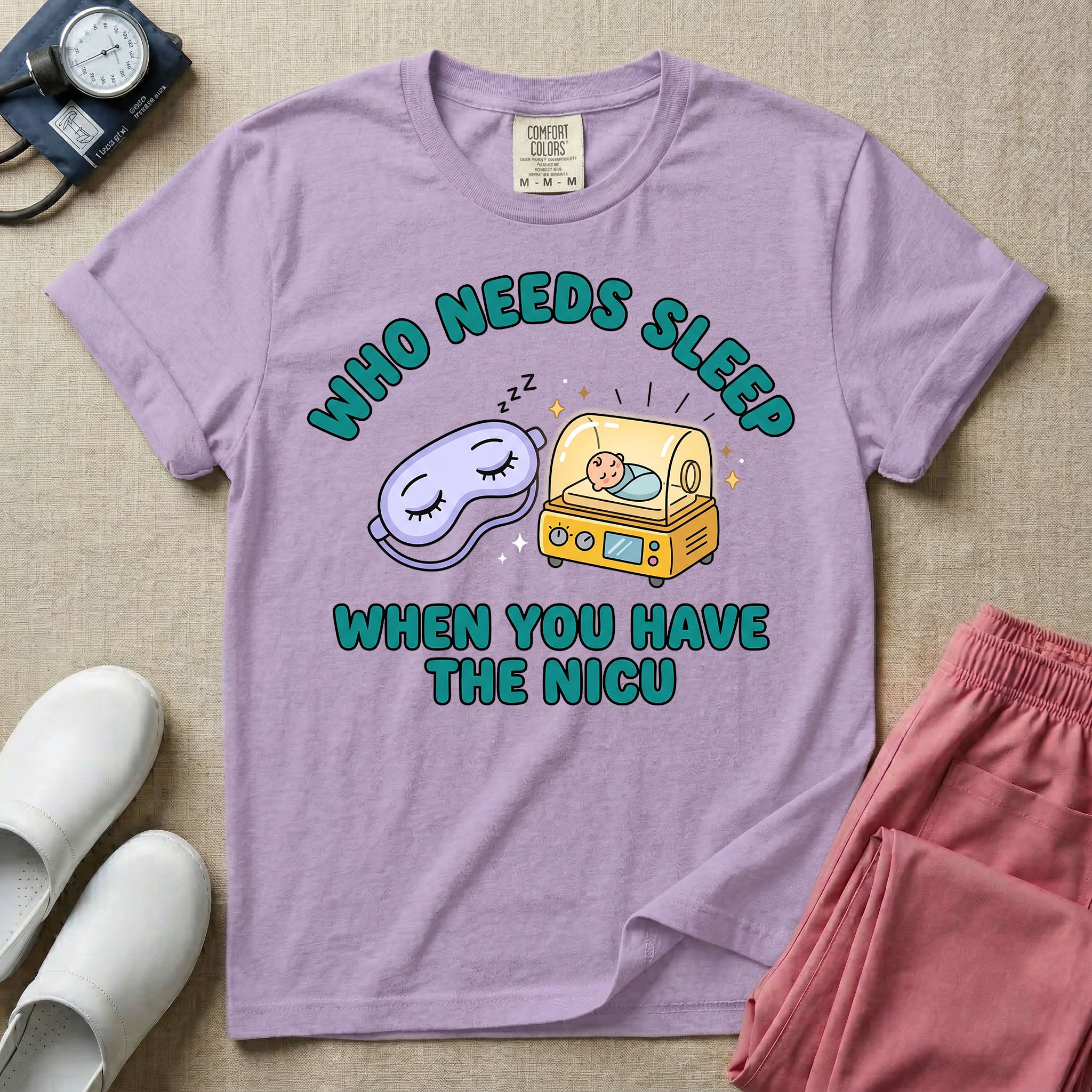 A funny neonatal intensive care unit t-shirt featuring an illustration of a purple sleep mask with Zs next to a yellow infant incubator with a baby inside, surrounded by the text "WHO NEEDS SLEEP WHEN YOU HAVE THE NICU" in a bold teal font.