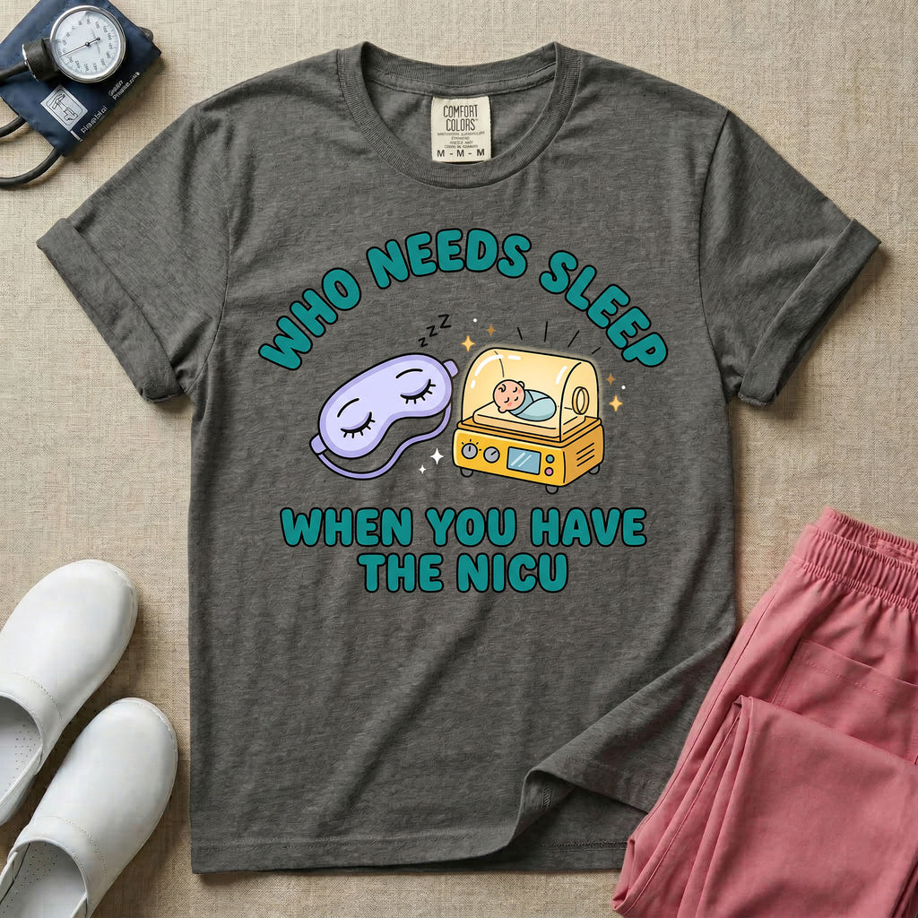 A funny neonatal intensive care unit t-shirt featuring an illustration of a purple sleep mask with Zs next to a yellow infant incubator with a baby inside, surrounded by the text "WHO NEEDS SLEEP WHEN YOU HAVE THE NICU" in a bold teal font.